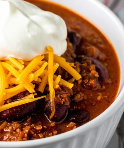Bowl of Chili with Cornbread and Toppings