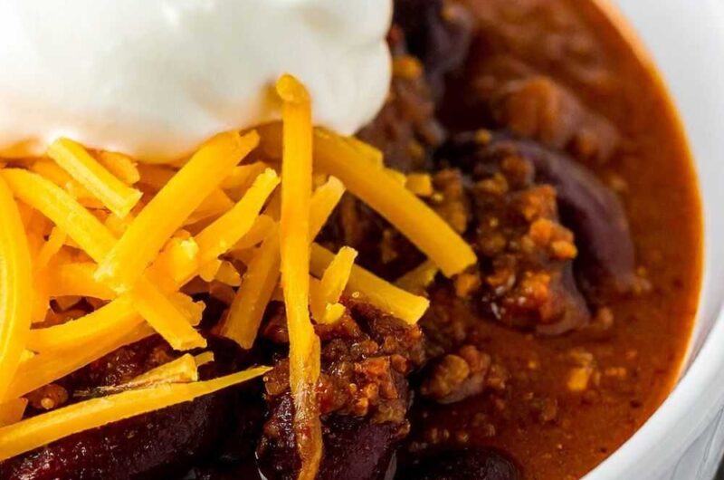 Bowl of Chili with Cornbread and Toppings